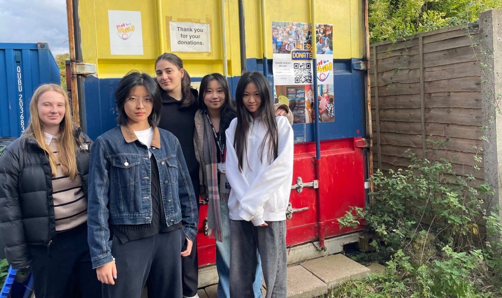 Girls outside our container
